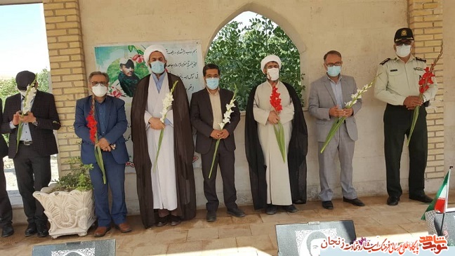 گزارش تصویری گلباران مزار شهدای ماهنشان