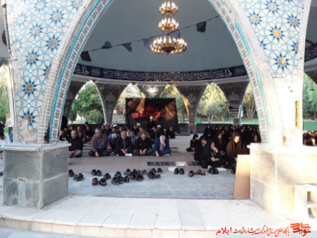 مراسم معنوی زیارت عاشورا در گلزار شهدای بهشت رضا شهرایلام